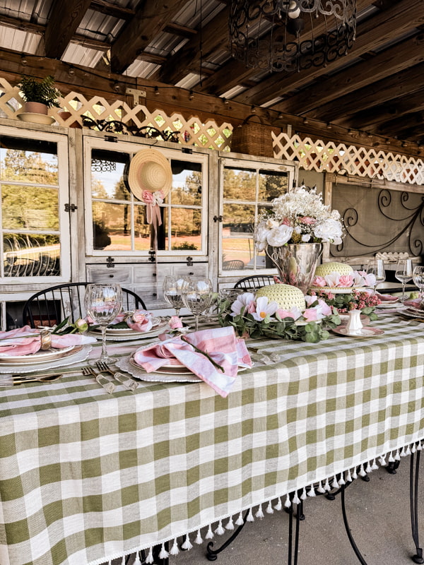 Alfresco Table Setting with pinks and green for a elegant Kentucky Derby Party idea.