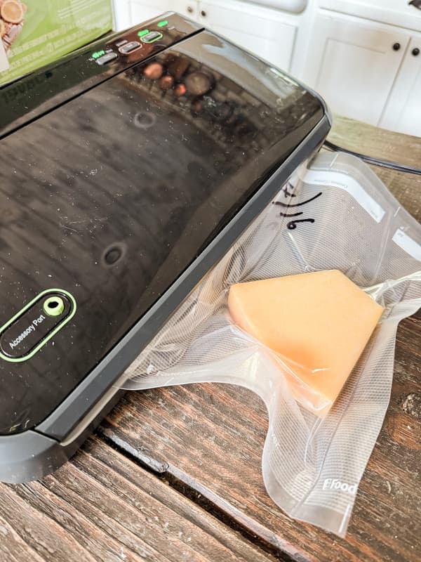 Vacuum seal the cheese to lock in flavors.  