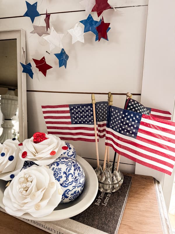 DIY Patriotic Paper roses with vintage buttons and flags and DIY star garland.  