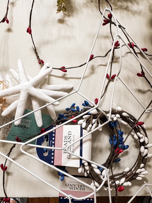 Dollar Tree Supplies to make a Starfish Wreath with Coastal and Patriotic Feel.