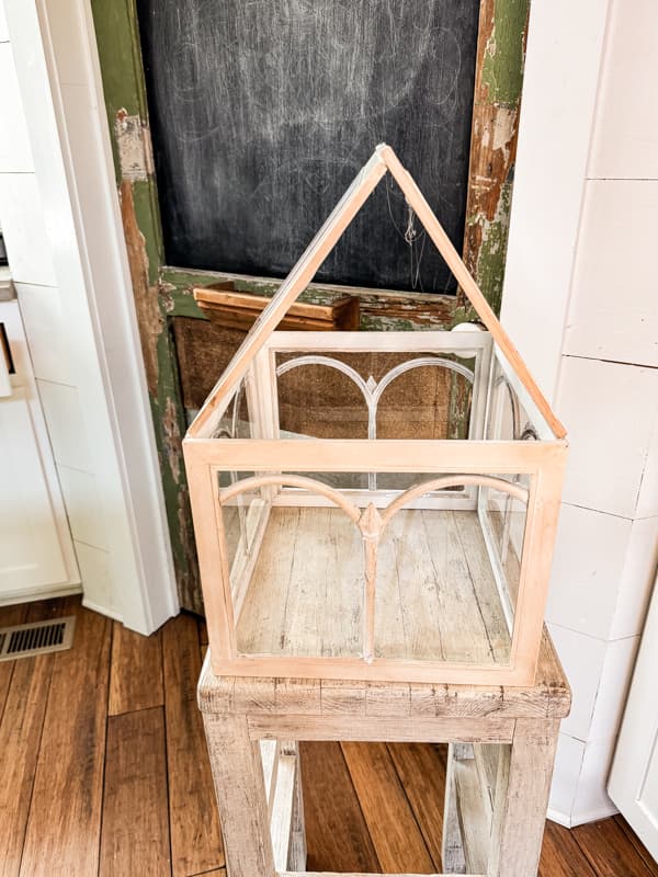 Use two picture frames to make the roof of the Glass terrarium with plants 