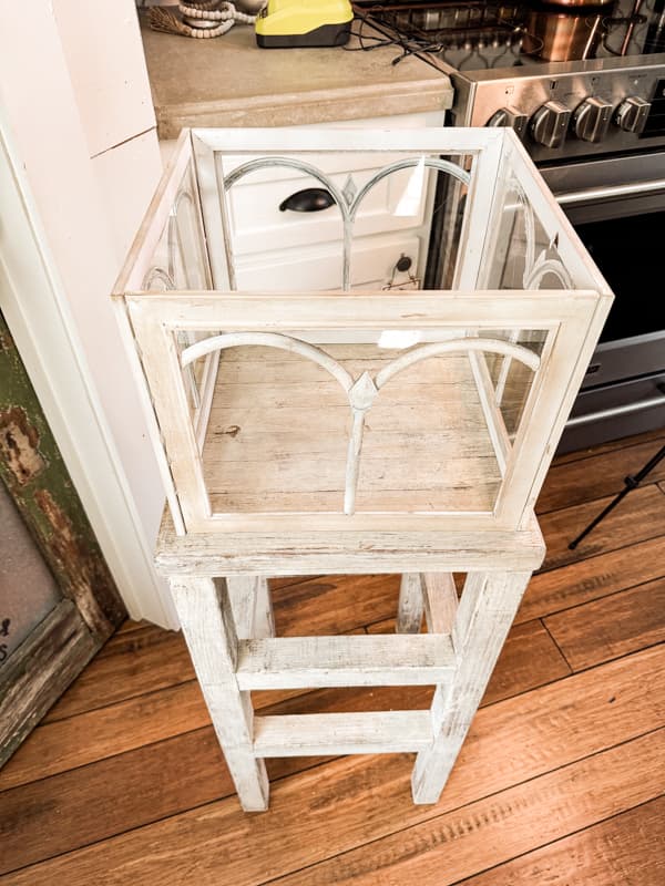 Add DIY Terrariium box to the bar stool as a base.  