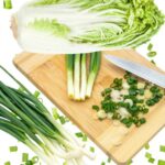 Napa Cabbage and Green Onions on chopping board