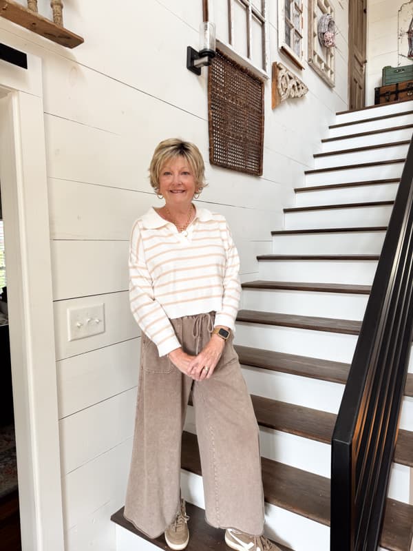 Rachel in new wig on steps