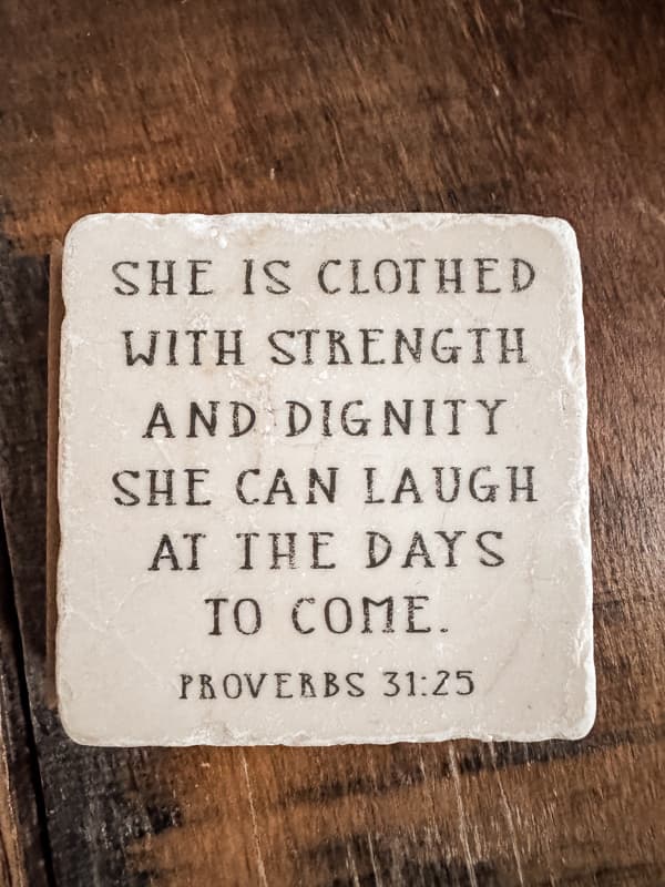 bible scripture on stone Proverbs 31:25