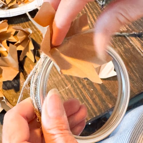 add faux corn husk to hot glue