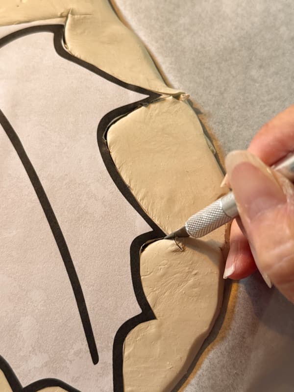 Cut leaf from air-dry clay with exacto knife.