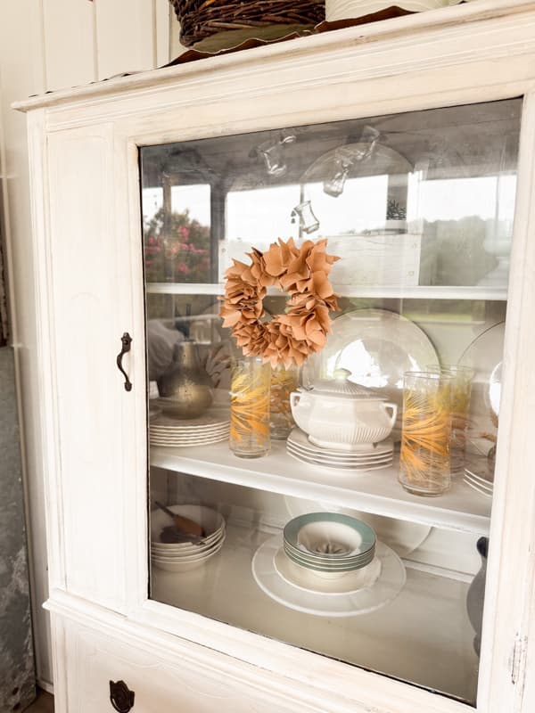 Mini-wreaths on china cabinet door