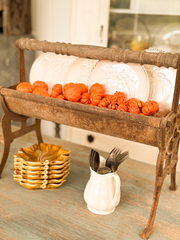 mini pumpkin bowl filler in vintage wrapping paper roller