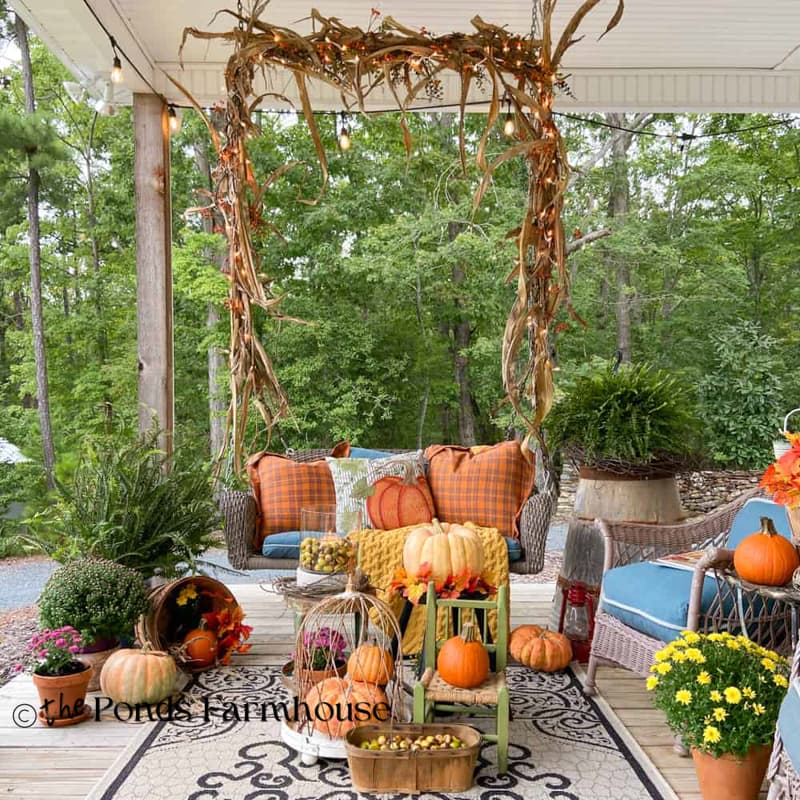 Fall porh with pumpkins, acorns & corn stalk garland