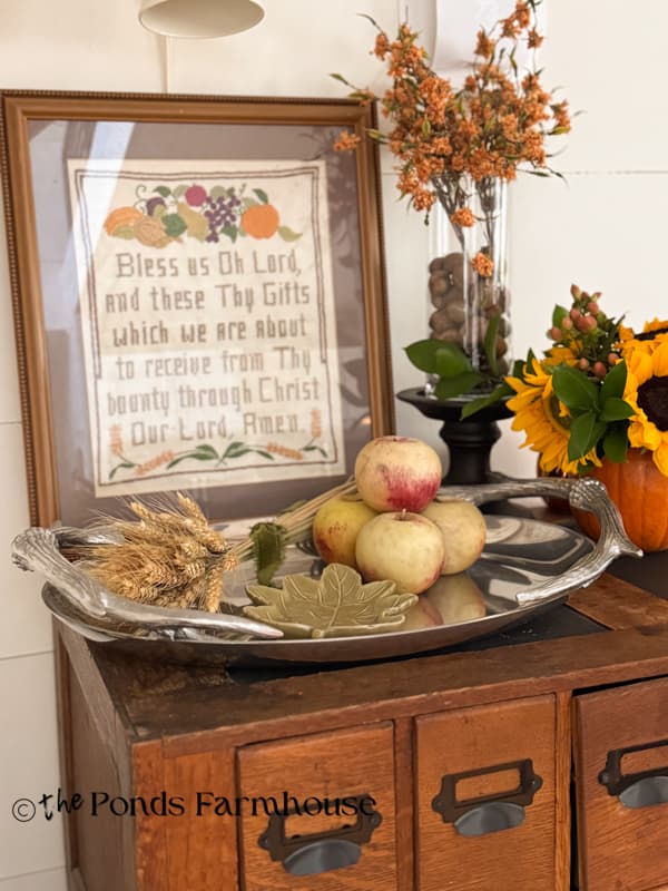 needlepoint vintage art, apples, wheat, and pumpkin arrangement.