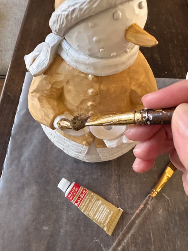 Add gold leaf rub n buff to snowman gloves