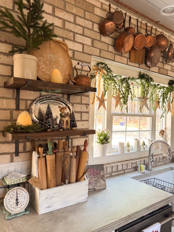 kitchen open shelves with window decorated for Christmas Tour 2025