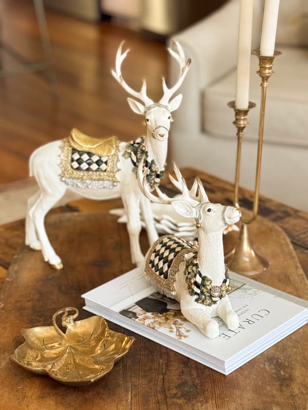 living room coffee table decorated with reindeer and candles for Christmas 2025