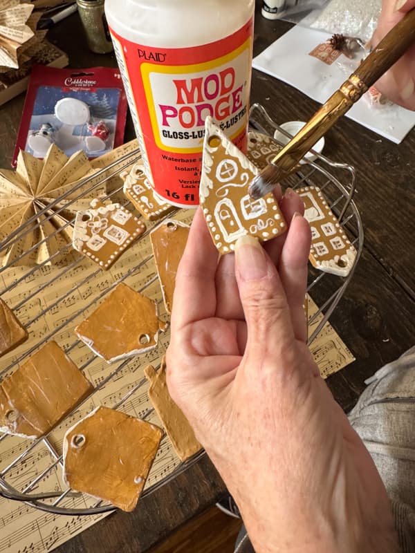 air dry clay gingerbread house ornaments sealed with mod podge