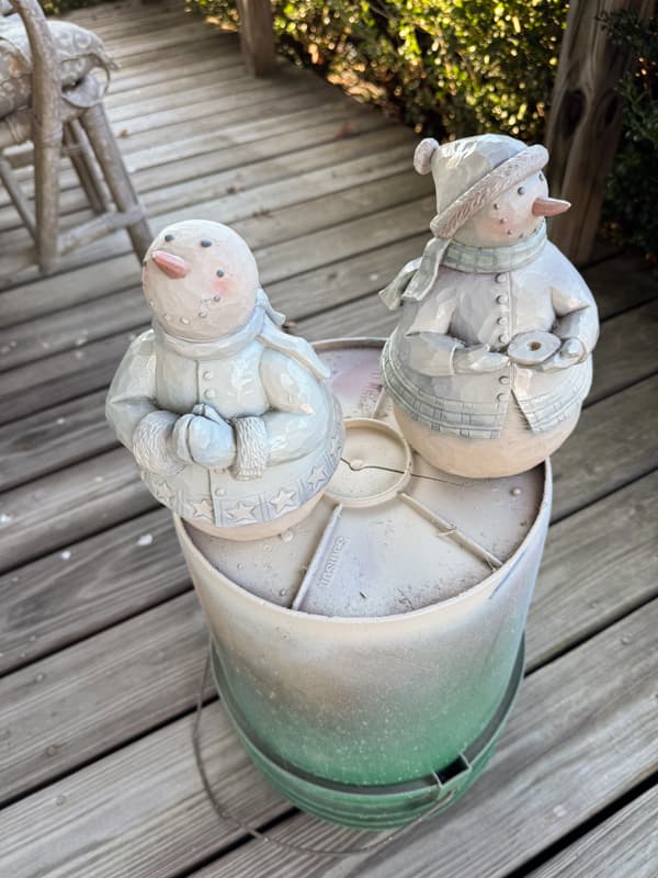 Add spray paint to thrifted snowmen