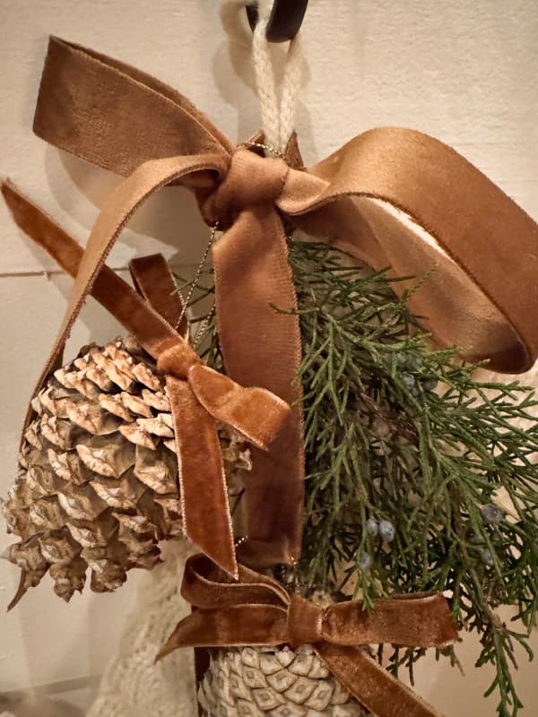 Tie a bow around the stocking hanger