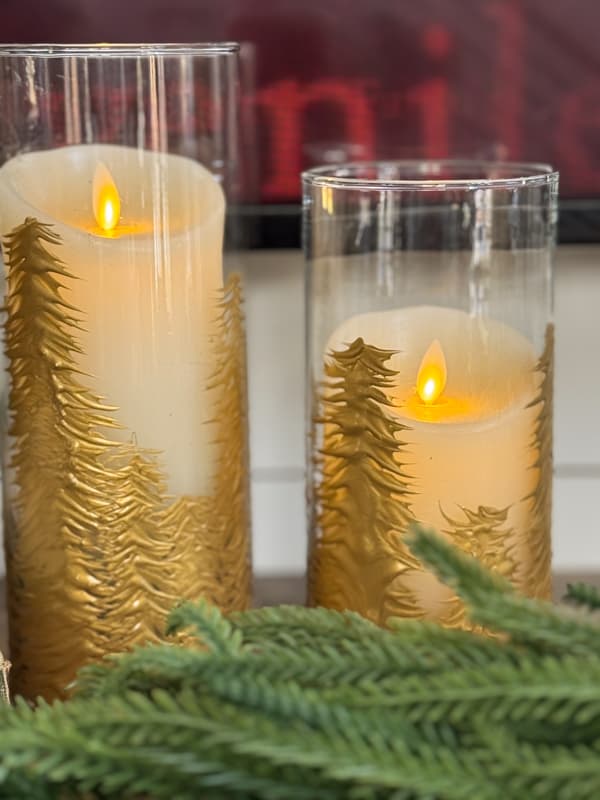 add flicker candles to glass vases with DIY gold trees