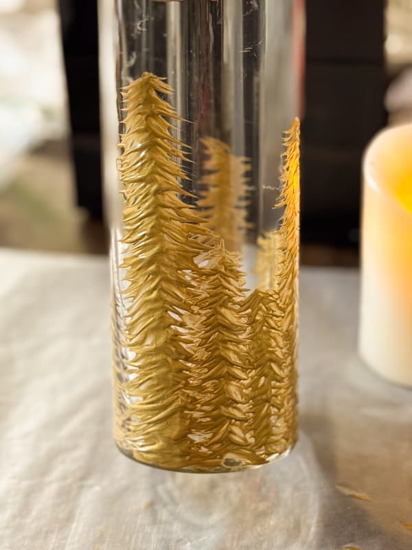 add gold painted trees to thrifted glass vases 
