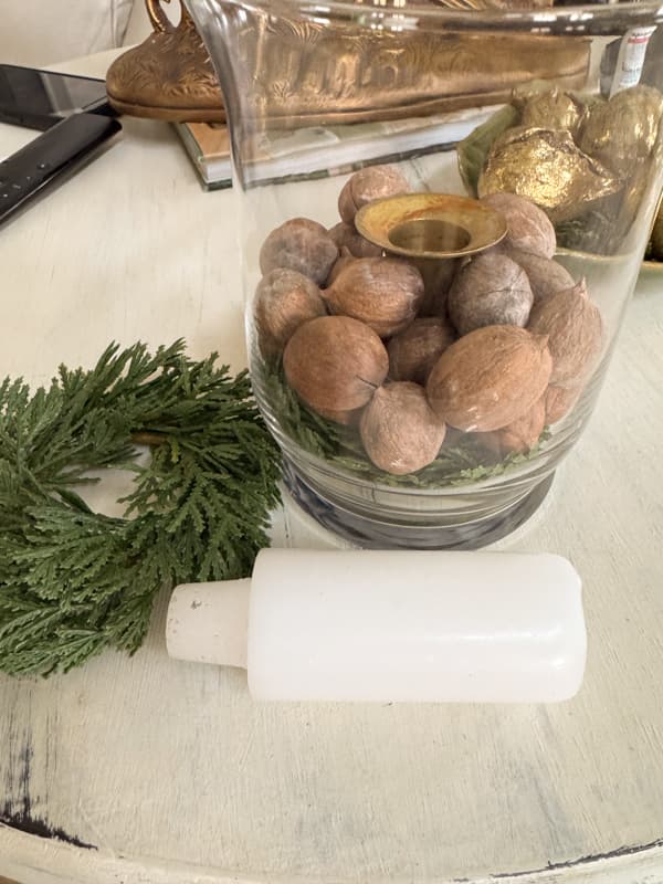 greenery ring, nuts and candleholder