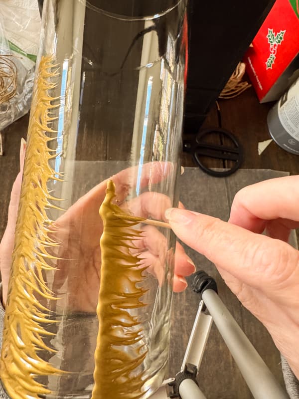 spread the paint with toothpick to look like trees