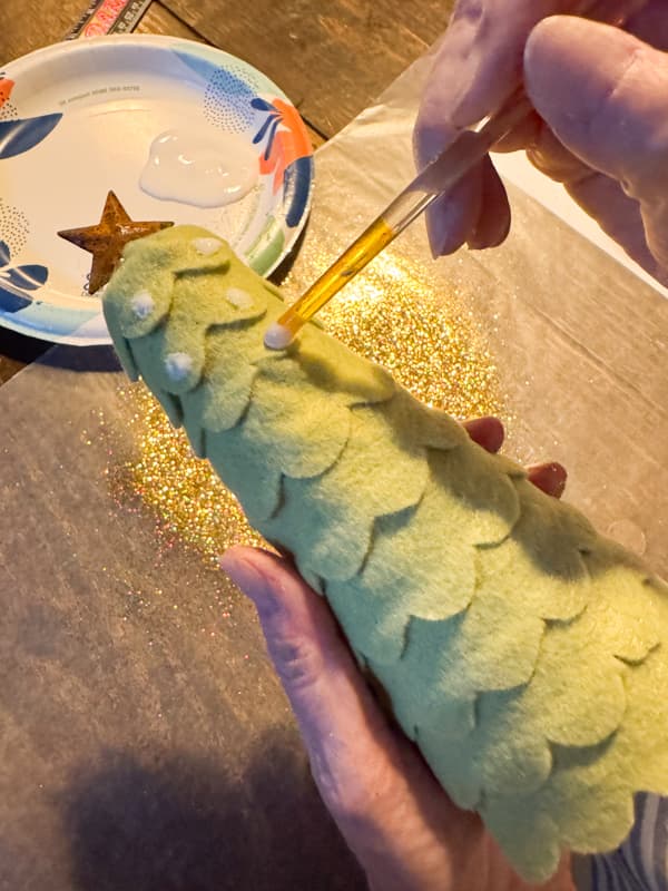 Add glue dots to fabric Felt Christmas Trees