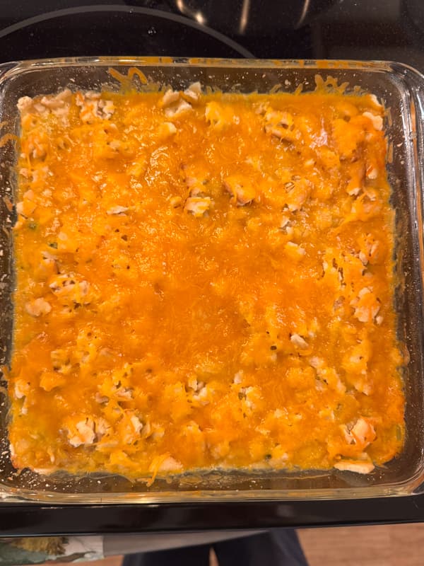 Cooked Broccoli Casserole with cheesy top.