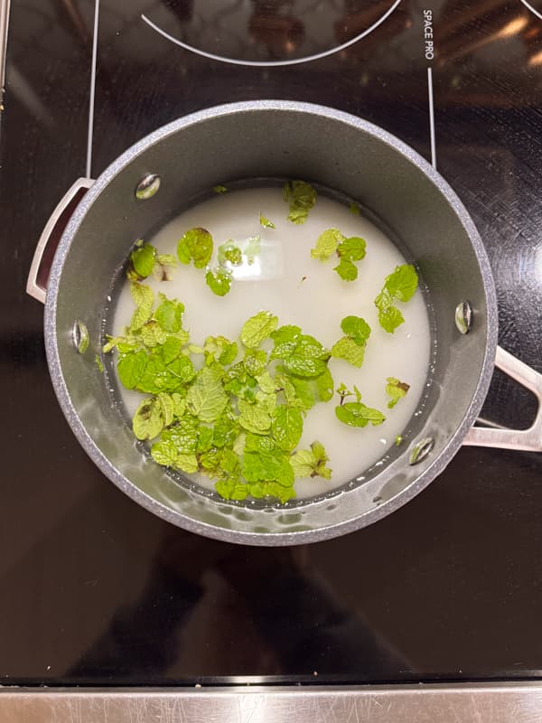 Mint leaves in sugar & Water to make simple syrup mint flavored
