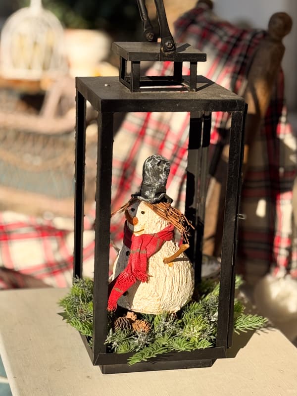 Lantern with snowman and greenery