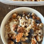 HomemadeGranola yogurt and blueberries in white bowl