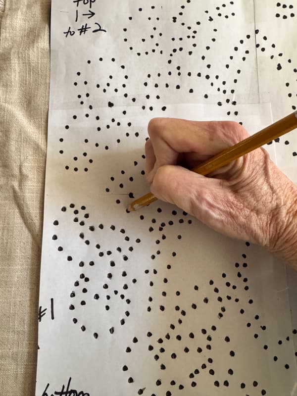 Use pencil to tranfer the design to the pillow cover with graphite paper