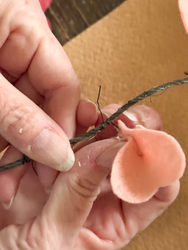 pinch felt hearts at the bottom to secure to the floral wire