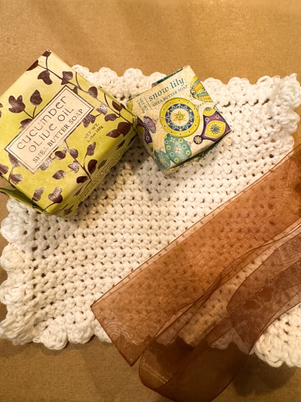 crochet dishcloth with soaps and ribbon
