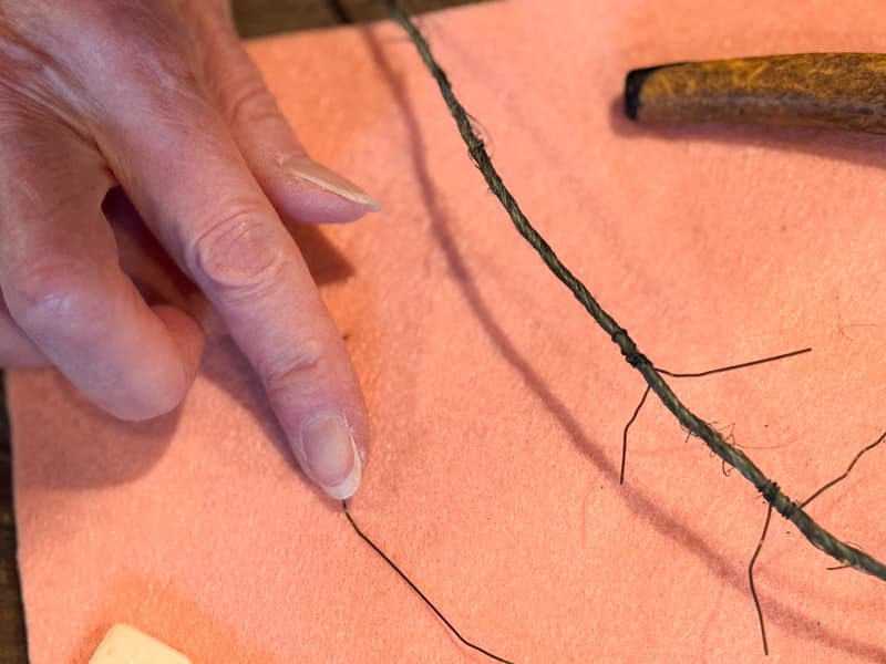 cut small pieces of floral wire to wrap around the heavy wrapped wire 