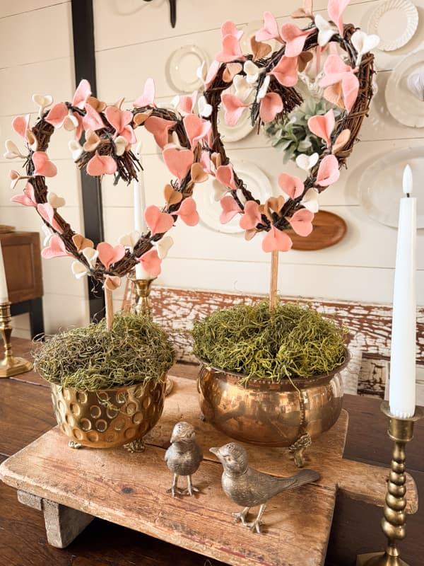 DIY Felt heart topiaries in brass containers and brass birds on table centerpiece
