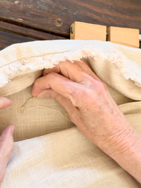 finish off the embroidery threads to inside of the pillow cover