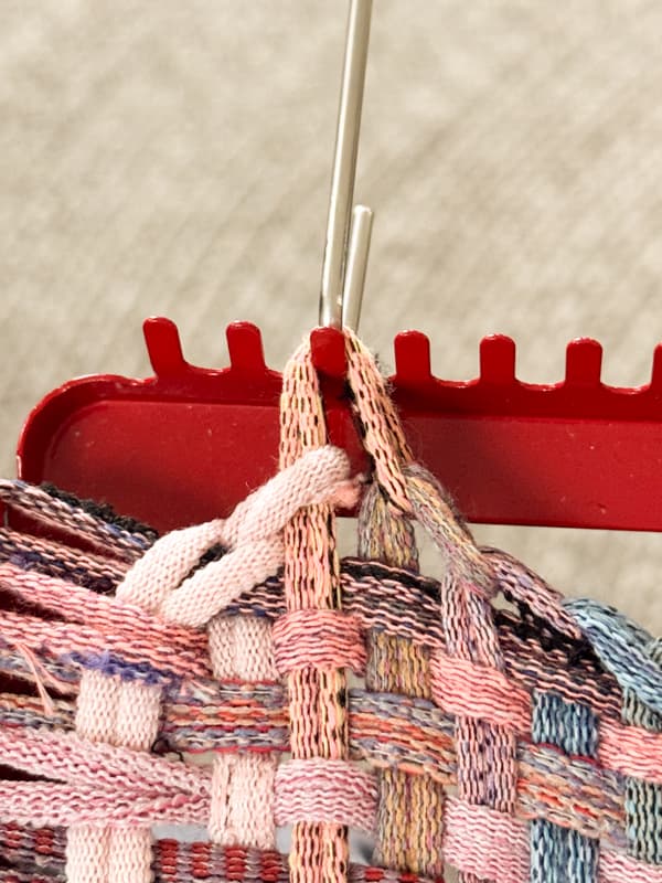 secure the loop to the frame by keeping them pull taut