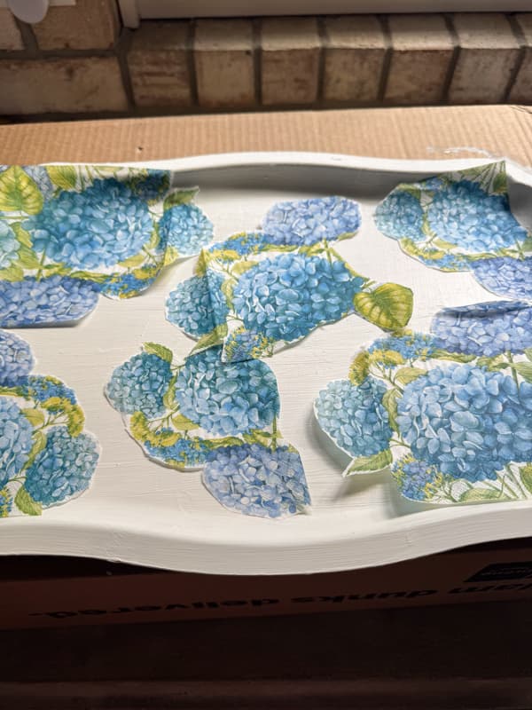 align the napkin pieces to determine placement on the tray