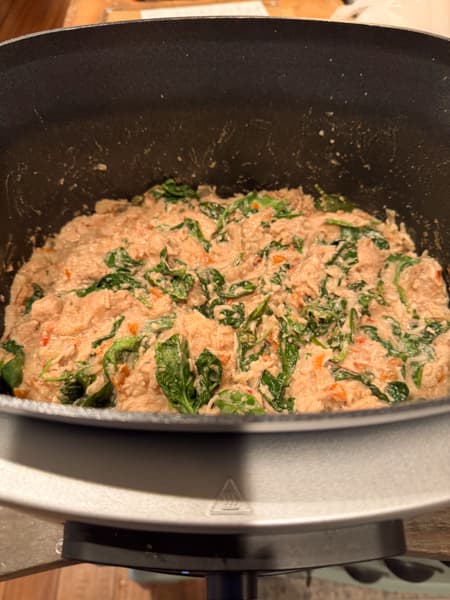 Spinach added to crock pot Thai Peanut Chicken High Protein Recipe