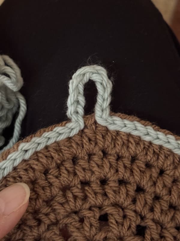 add crochet loop for button closure on crochet eyeglass case