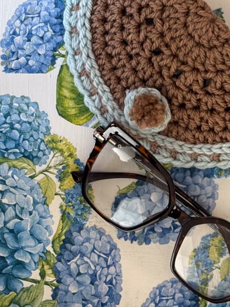 DiY hydrangea tray with crochet eyeglass case and eye glasses