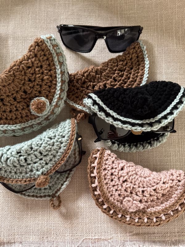 various designs of DIY crochet Eyeglass holders with glasses