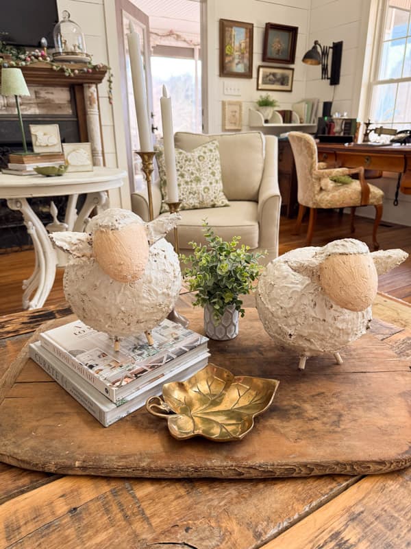 two chunk fat DIY Styrofoam, TP Rolls, & Spackling lambs boutique style high end Easter Decor.