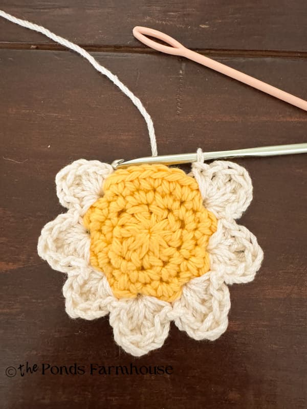 Adding petals until you are almost around the circle