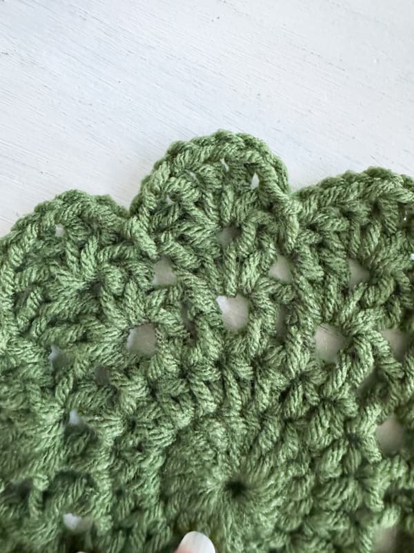 close up of scallop edge of doily