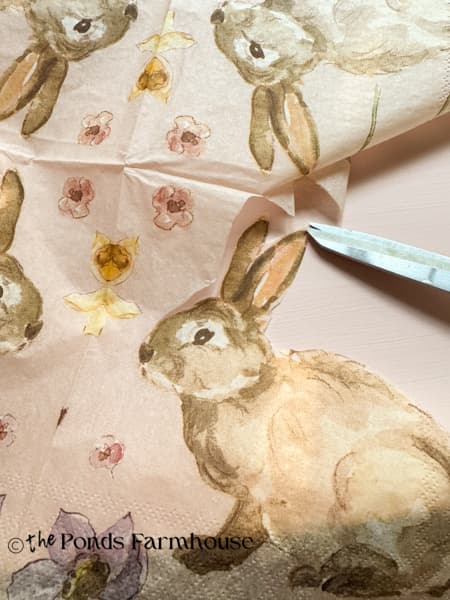 Cut the bunny and other details from the napkin
