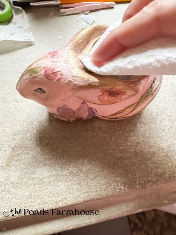 add Rub N Buff around edges of napkin decoupage thrifted bunny candleholder