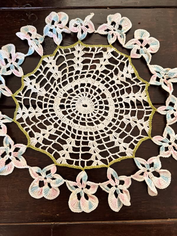 Vintage doily in cream and pink