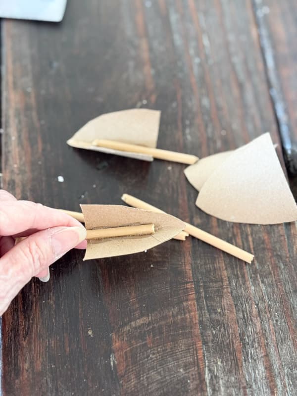 adding dowel rod to toilet paper ears for Chunky DIY Lamb