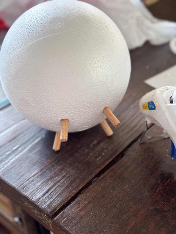 adding dowel rods for lambs legs with hot glue